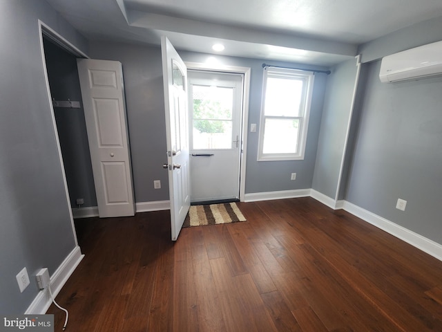 2258 Arlington Ter, Alexandria, VA 22303 - doorway to outside with a wall mounted air conditioner, dark wood finished floors, and recessed lighting