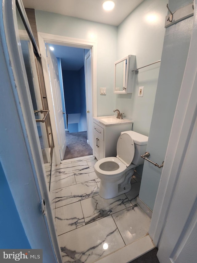 2258 Arlington Ter, Alexandria, VA 22303 - bathroom featuring marble finish flooring, vanity, and recessed lighting