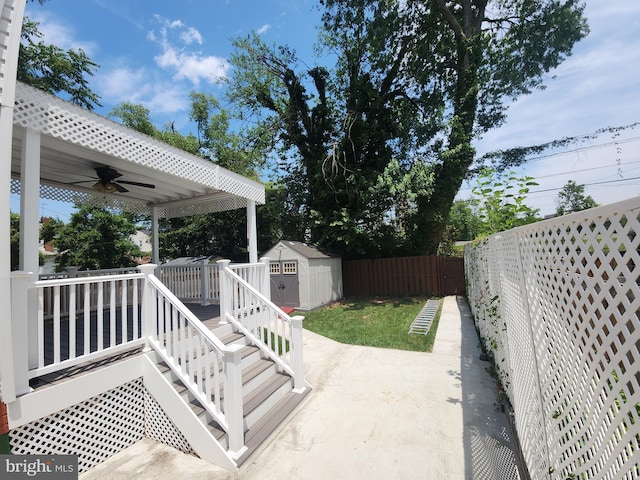 2258 Arlington Ter, Alexandria, VA 22303 - fenced backyard featuring ceiling fan, a shed, and a patio