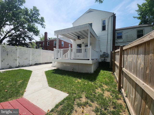 2258 Arlington Ter, Alexandria, VA 22303 - back of house featuring a ceiling fan, a wooden deck, and a fenced backyard