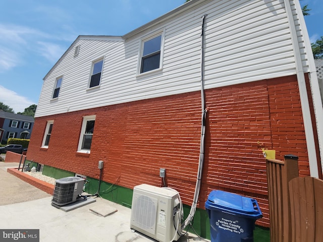 2258 Arlington Ter, Alexandria, VA 22303 - view of property exterior with a cooling unit and brick siding