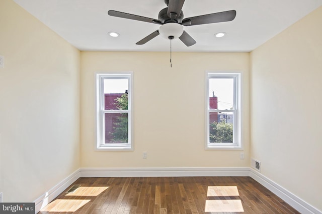 244 N Rose St, Baltimore, MD 21224 - empty room with dark wood-type flooring, a ceiling fan, and recessed lighting