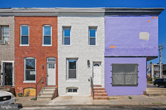 244 N Rose St, Baltimore, MD 21224 - view of property with entry steps and stone siding