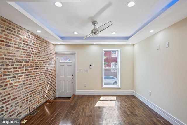 244 N Rose St, Baltimore, MD 21224 - entrance foyer featuring brick wall, ceiling fan, a raised ceiling, wood-type flooring, and recessed lighting