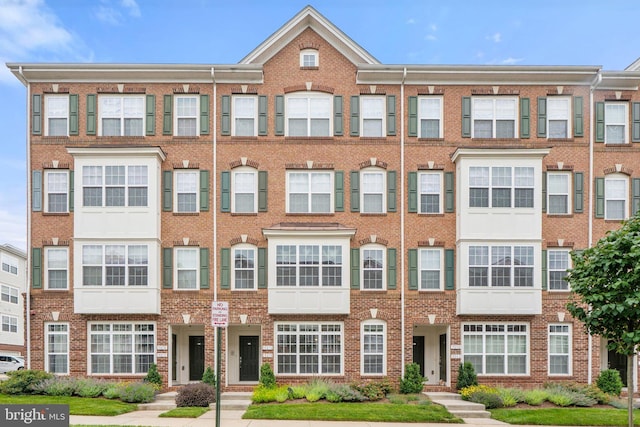 19278 Harlow Sq, Leesburg, VA 20176 - view of front of house with brick siding