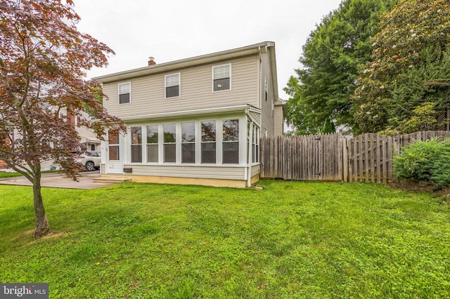 739 Brooke Cir, Morton, PA 19070 - rear view of house with a chimney, a gate, and a patio