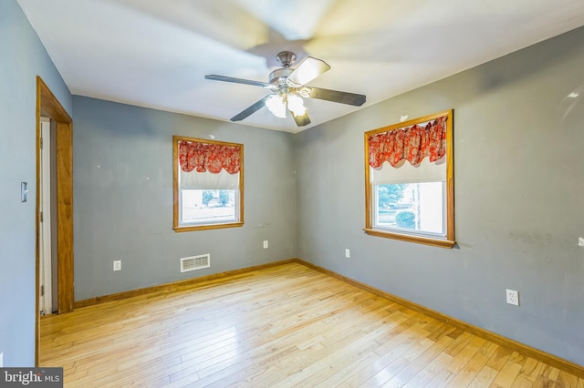 739 Brooke Cir, Morton, PA 19070 - spare room featuring plenty of natural light, hardwood / wood-style floors, and a ceiling fan