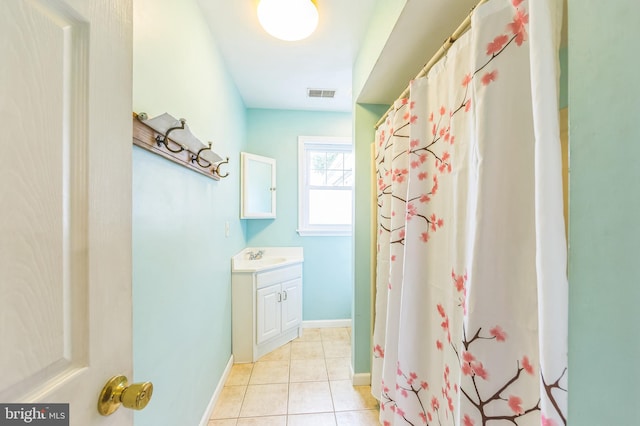 739 Brooke Cir, Morton, PA 19070 - full bath with vanity, tile patterned floors, and curtained shower