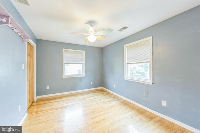 739 Brooke Cir, Morton, PA 19070 - unfurnished room featuring healthy amount of natural light, a ceiling fan, and light wood-type flooring