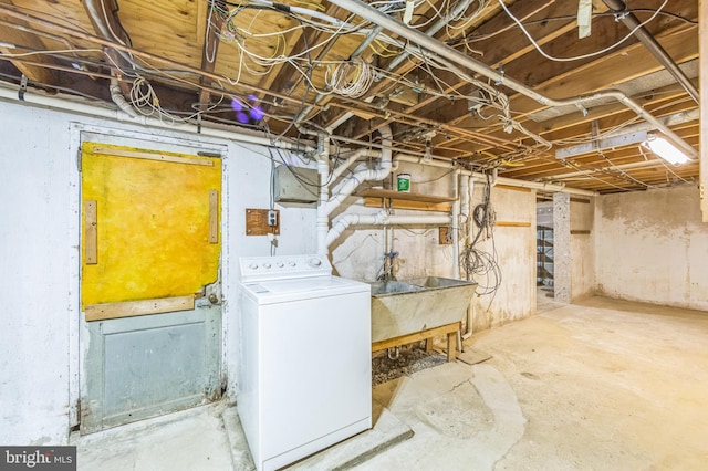 739 Brooke Cir, Morton, PA 19070 - unfinished below grade area with washer / clothes dryer and a sink
