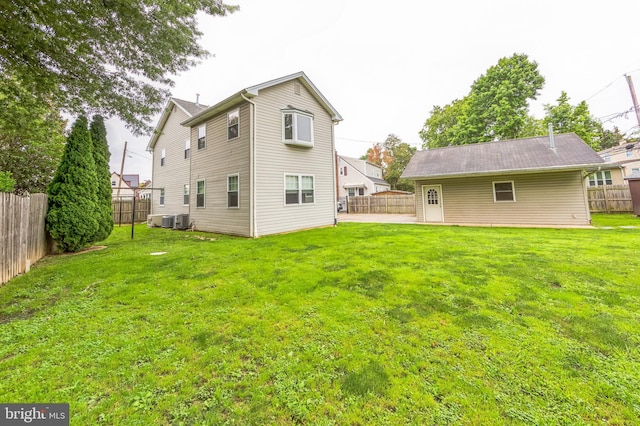 739 Brooke Cir, Morton, PA 19070 - back of house with a fenced backyard
