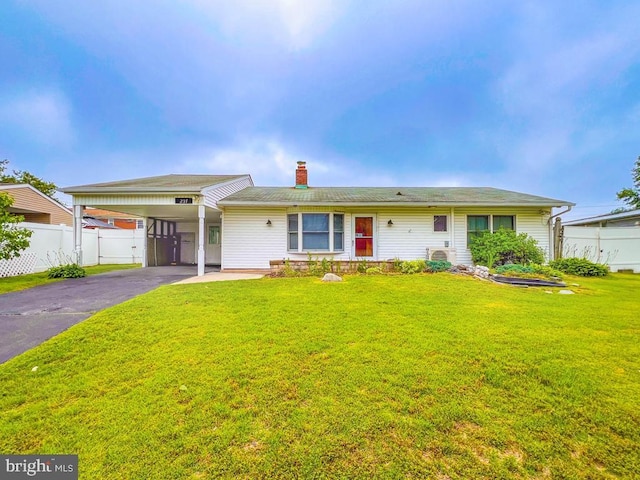 237 Lakeside Dr Unit N, Levittown, PA 19054 - single story home featuring a carport, driveway, and a chimney