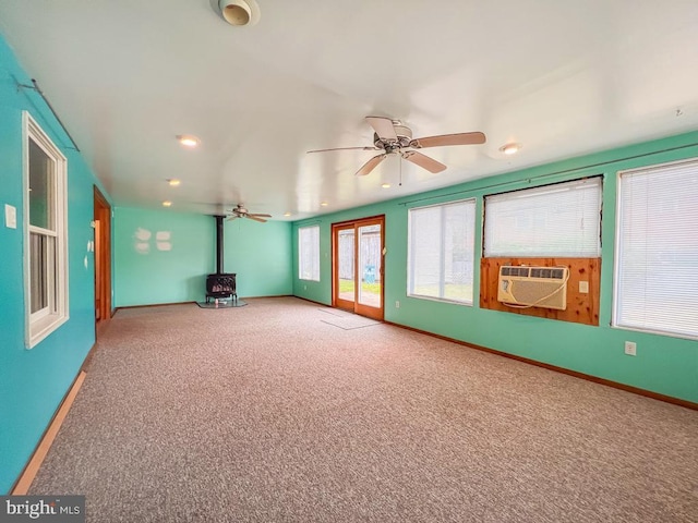237 Lakeside Dr Unit N, Levittown, PA 19054 - unfurnished sunroom with a wood stove and cooling unit