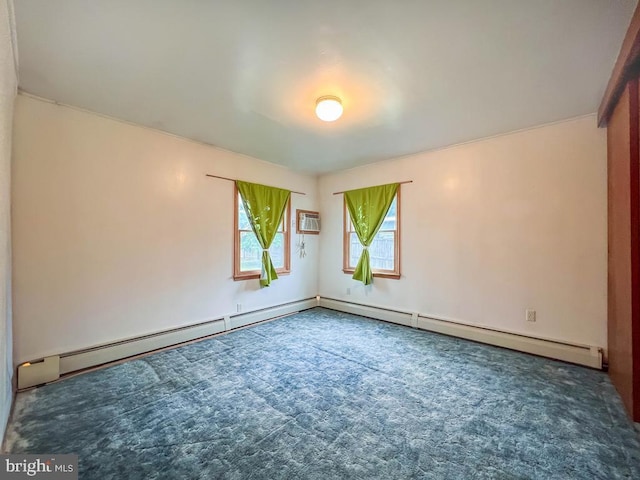 237 Lakeside Dr Unit N, Levittown, PA 19054 - carpeted empty room featuring a wall unit AC and baseboard heating