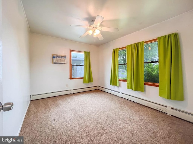 237 Lakeside Dr Unit N, Levittown, PA 19054 - empty room with carpet flooring, healthy amount of natural light, ceiling fan, and a baseboard radiator