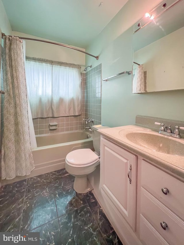 237 Lakeside Dr Unit N, Levittown, PA 19054 - bathroom featuring shower / bathtub combination with curtain, vanity, and marble finish flooring