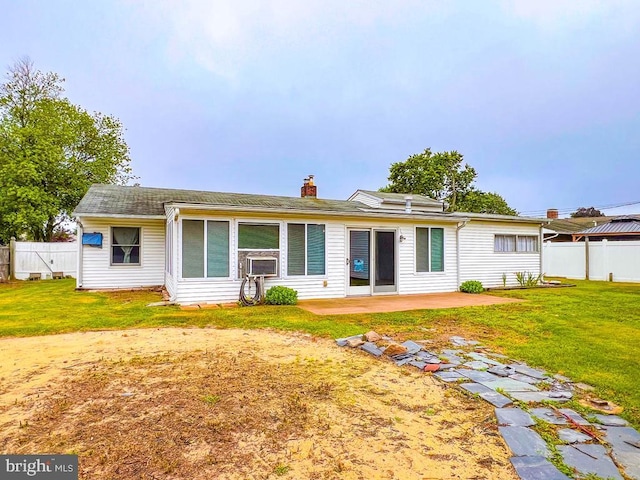 237 Lakeside Dr Unit N, Levittown, PA 19054 - back of property with a patio, cooling unit, and a chimney