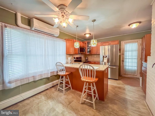 237 Lakeside Dr Unit N, Levittown, PA 19054 - kitchen with stainless steel appliances, a wall unit AC, a peninsula, ceiling fan, and plenty of natural light