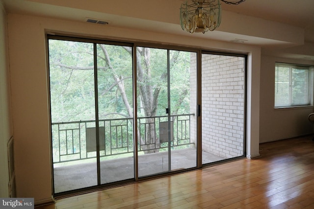 12213 Braxfield Ct Unit 15, Rockville, MD 20852 - entryway with a chandelier, hardwood / wood-style floors, and healthy amount of natural light