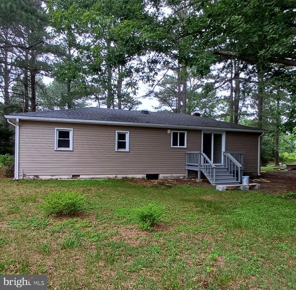 1171 Jones Creek Rd, Warsaw, VA 22572 - back of property featuring a lawn