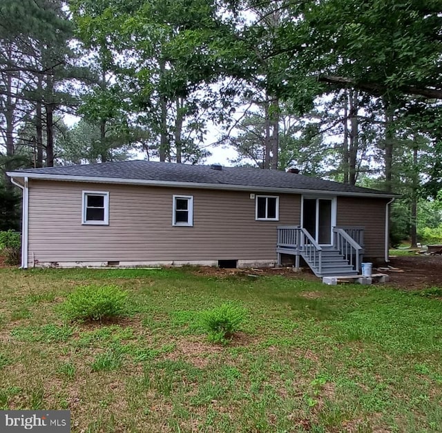 1171 Jones Creek Rd, Warsaw, VA 22572 - back of property featuring a lawn