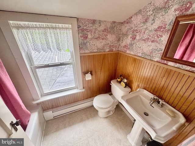 18 Benedict Rd, Lancaster, PA 17603 - bathroom featuring baseboard heating, wallpapered walls, and wainscoting