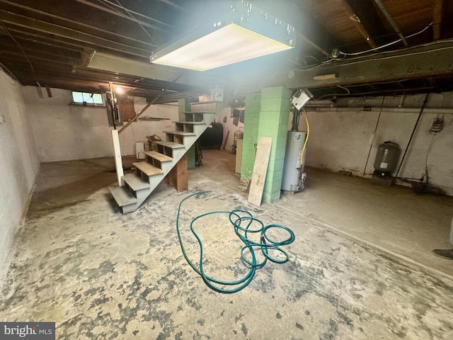 18 Benedict Rd, Lancaster, PA 17603 - basement with gas water heater, stairway, and a water pressure tank