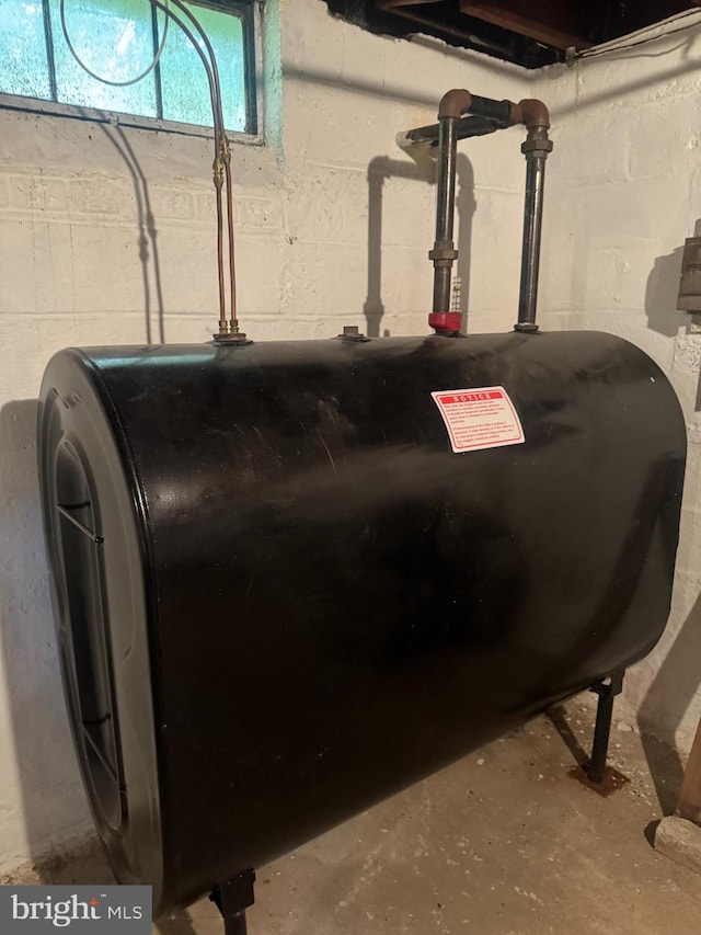 18 Benedict Rd, Lancaster, PA 17603 - basement view of oil tank and concrete flooring
