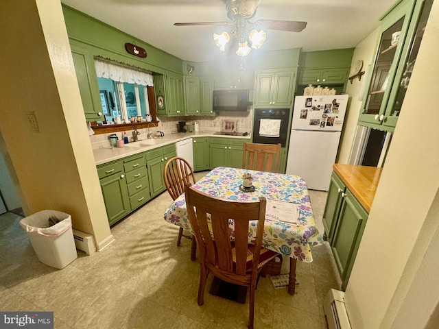 18 Benedict Rd, Lancaster, PA 17603 - kitchen with green cabinetry, black appliances, ceiling fan, tasteful backsplash, and butcher block counters