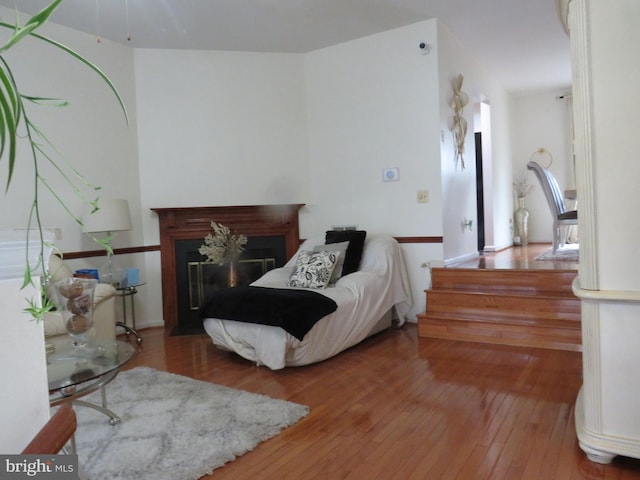 12310 Herrington Manor Dr, Silver Spring, MD 20904 - bedroom featuring hardwood / wood-style floors and a fireplace
