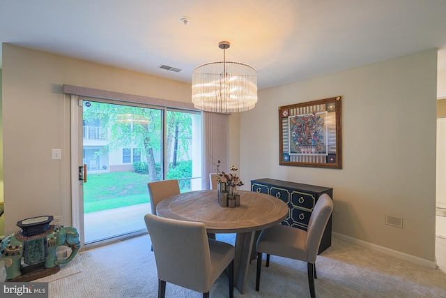 9209 Howard Square Dr Unit 9209, Pikesville, MD 21208 - carpeted dining room with a chandelier and baseboards