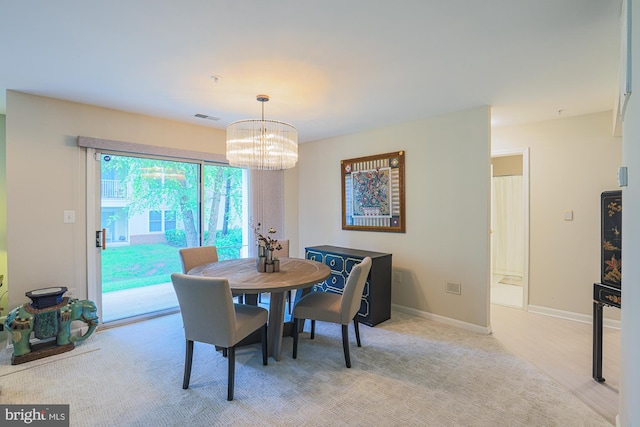 9209 Howard Square Dr Unit 9209, Pikesville, MD 21208 - dining room with a chandelier and baseboards