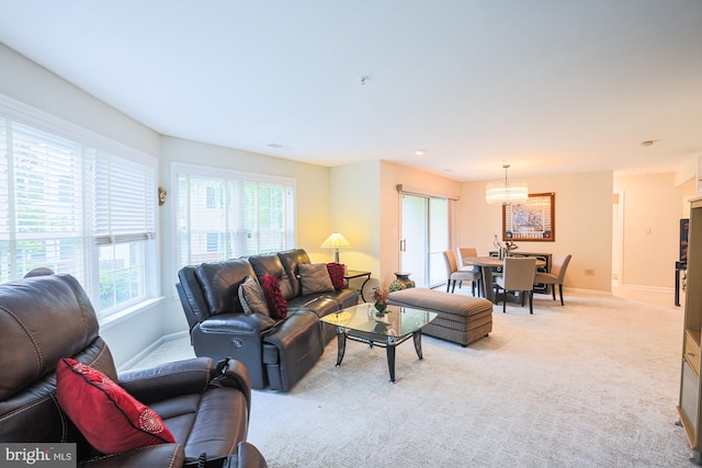 9209 Howard Square Dr Unit 9209, Pikesville, MD 21208 - living area featuring light colored carpet and a chandelier