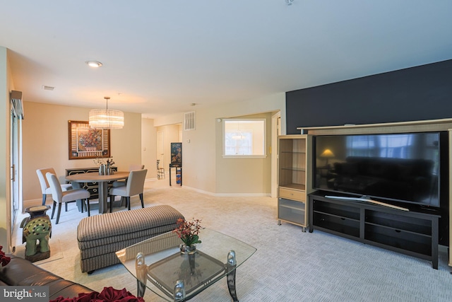 9209 Howard Square Dr Unit 9209, Pikesville, MD 21208 - living room featuring light colored carpet and a chandelier