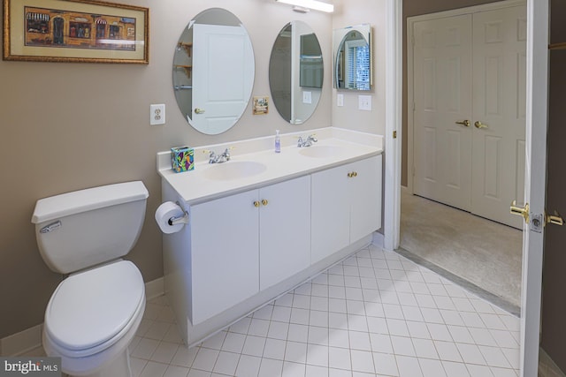 9209 Howard Square Dr Unit 9209, Pikesville, MD 21208 - bathroom featuring double vanity and tile patterned floors