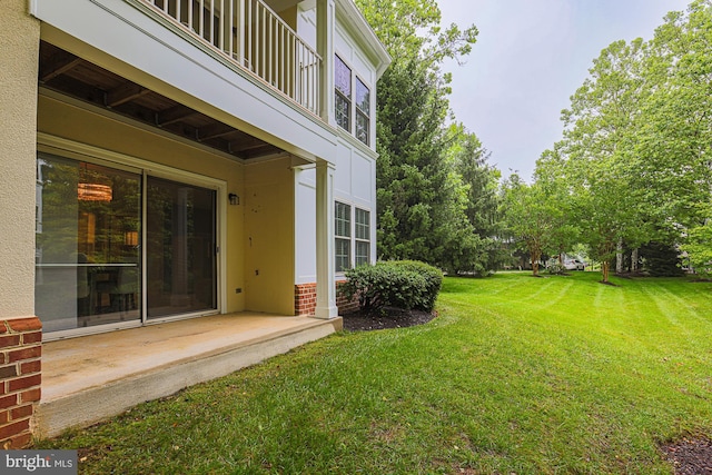 9209 Howard Square Dr Unit 9209, Pikesville, MD 21208 - view of grassy yard with a balcony