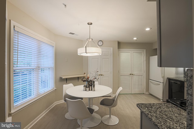 9209 Howard Square Dr Unit 9209, Pikesville, MD 21208 - dining room featuring light wood finished floors and recessed lighting