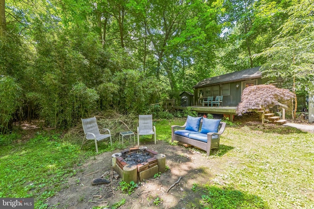 361 E Knowlton Rd, Media, PA 19063 - view of yard with a wooden deck, an outdoor living space with a fire pit, and a forest view