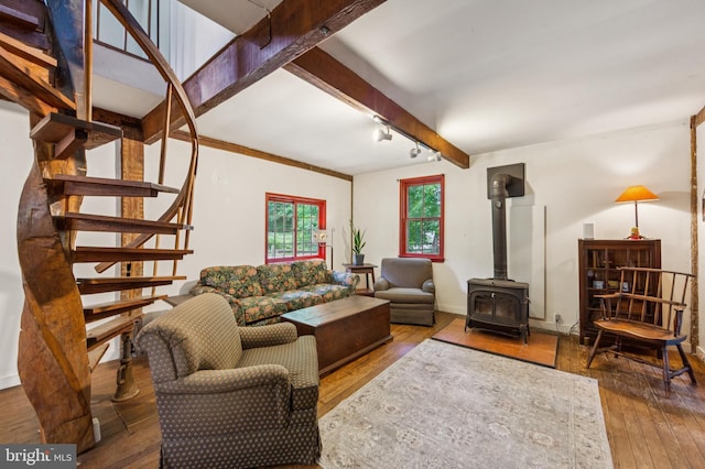 361 E Knowlton Rd, Media, PA 19063 - living room with a wood stove, wood-type flooring, stairs, and beamed ceiling