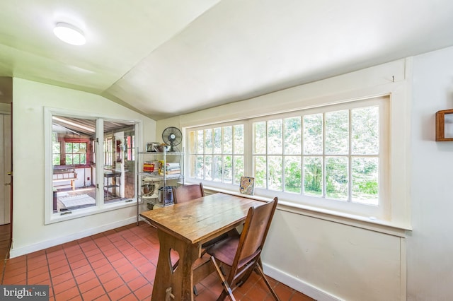 361 E Knowlton Rd, Media, PA 19063 - dining area featuring vaulted ceiling, dark tile patterned floors, and healthy amount of natural light
