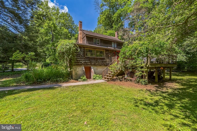 361 E Knowlton Rd, Media, PA 19063 - rear view of property featuring stairway, a chimney, a lawn, and a deck