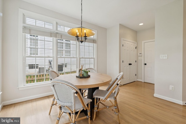 18416 Mill Run Ct, Leesburg, VA 20176 - dining room with a chandelier, plenty of natural light, light wood finished floors, and recessed lighting