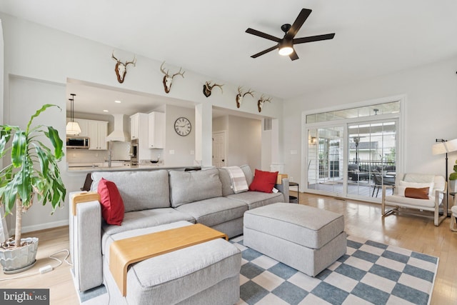 18416 Mill Run Ct, Leesburg, VA 20176 - living room with light wood-style floors and a ceiling fan