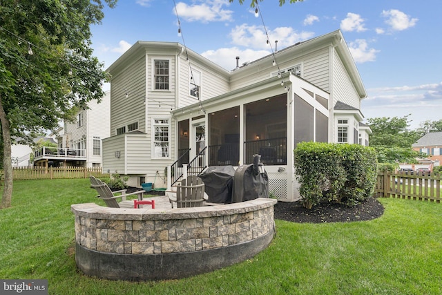 18416 Mill Run Ct, Leesburg, VA 20176 - back of house with a sunroom, a patio, and a fire pit