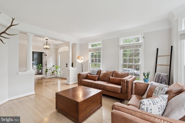 18416 Mill Run Ct, Leesburg, VA 20176 - living area featuring decorative columns, light wood finished floors, and ornamental molding