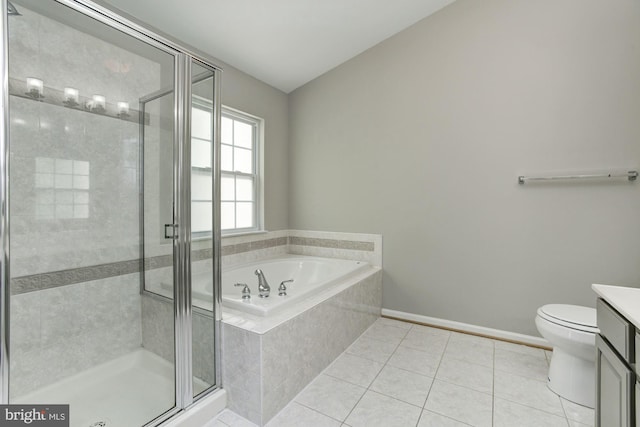 7041 Water Oak Rd Unit 42, Elkridge, MD 21075 - bathroom featuring vanity, a garden tub, tile patterned flooring, and a stall shower