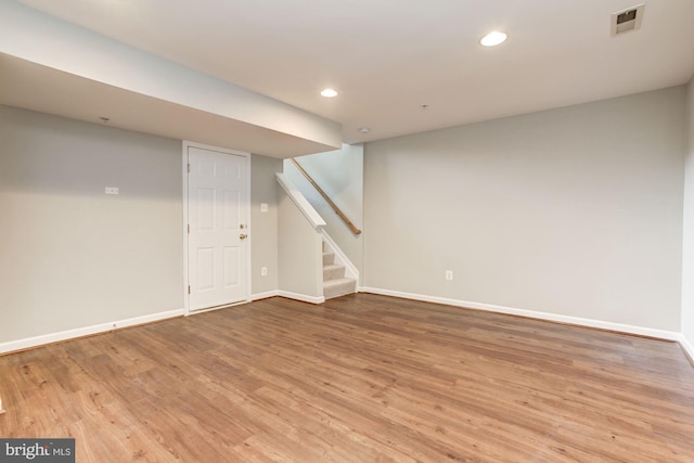 7041 Water Oak Rd Unit 42, Elkridge, MD 21075 - finished basement with light wood-type flooring, stairway, and recessed lighting