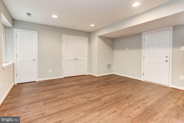 7041 Water Oak Rd Unit 42, Elkridge, MD 21075 - finished below grade area featuring wood finished floors and recessed lighting