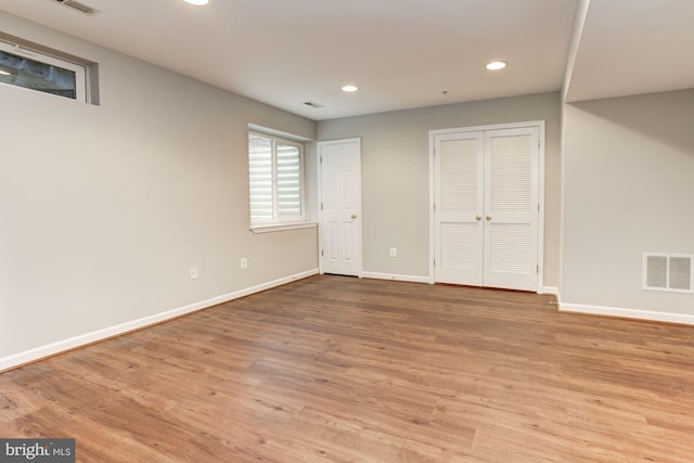 7041 Water Oak Rd Unit 42, Elkridge, MD 21075 - unfurnished bedroom with recessed lighting, wood finished floors, and a closet