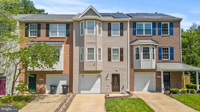 5522 Trout Run Rd, Clinton, MD 20735 - townhome / multi-family property featuring driveway, a garage, and brick siding